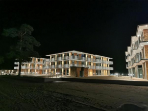 Lägenhet på stranden i Åhus med havsutsikt och närhet till Spa & utomhuspool in Åhus